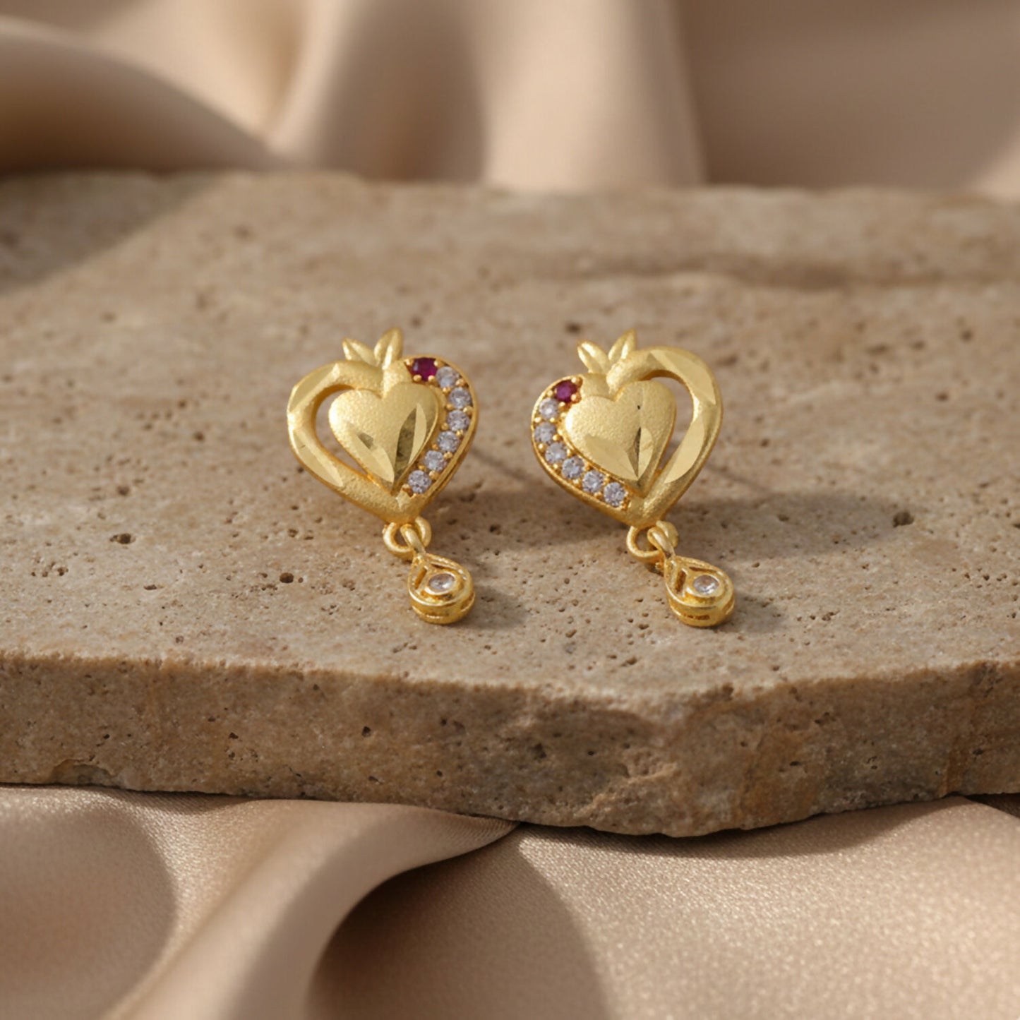 Heart Shaped Gold Finish Earrings With Crystal Border And Delicate Hanging Drop