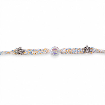 Pastel Braided Rakhi with Blue-White Thread and Crystal Bead Charm for Raksha Bandhan