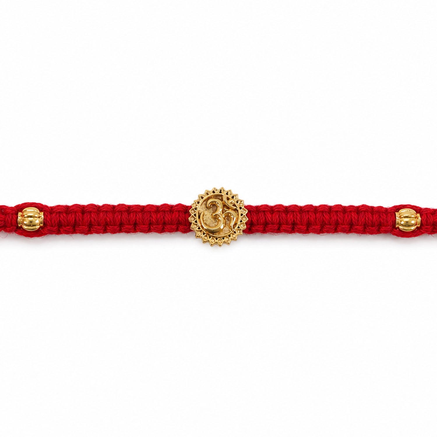 Red Thread Rakhi with an Antique Gold Om Pendant and Beaded Accents