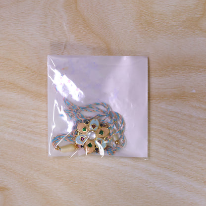 Eight Petal Floral Kundan Pendant Rakhi with Pastel Beads