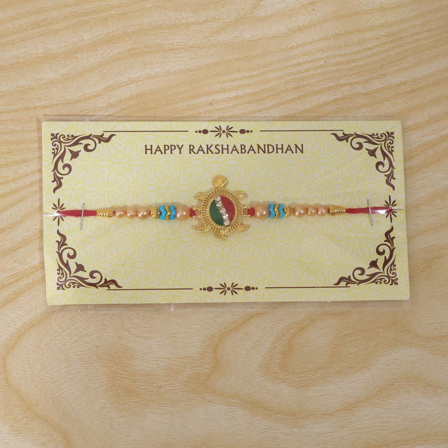 Auspicious Tortoise Meenakari Stone-Studded Beaded Rakhi for Brother