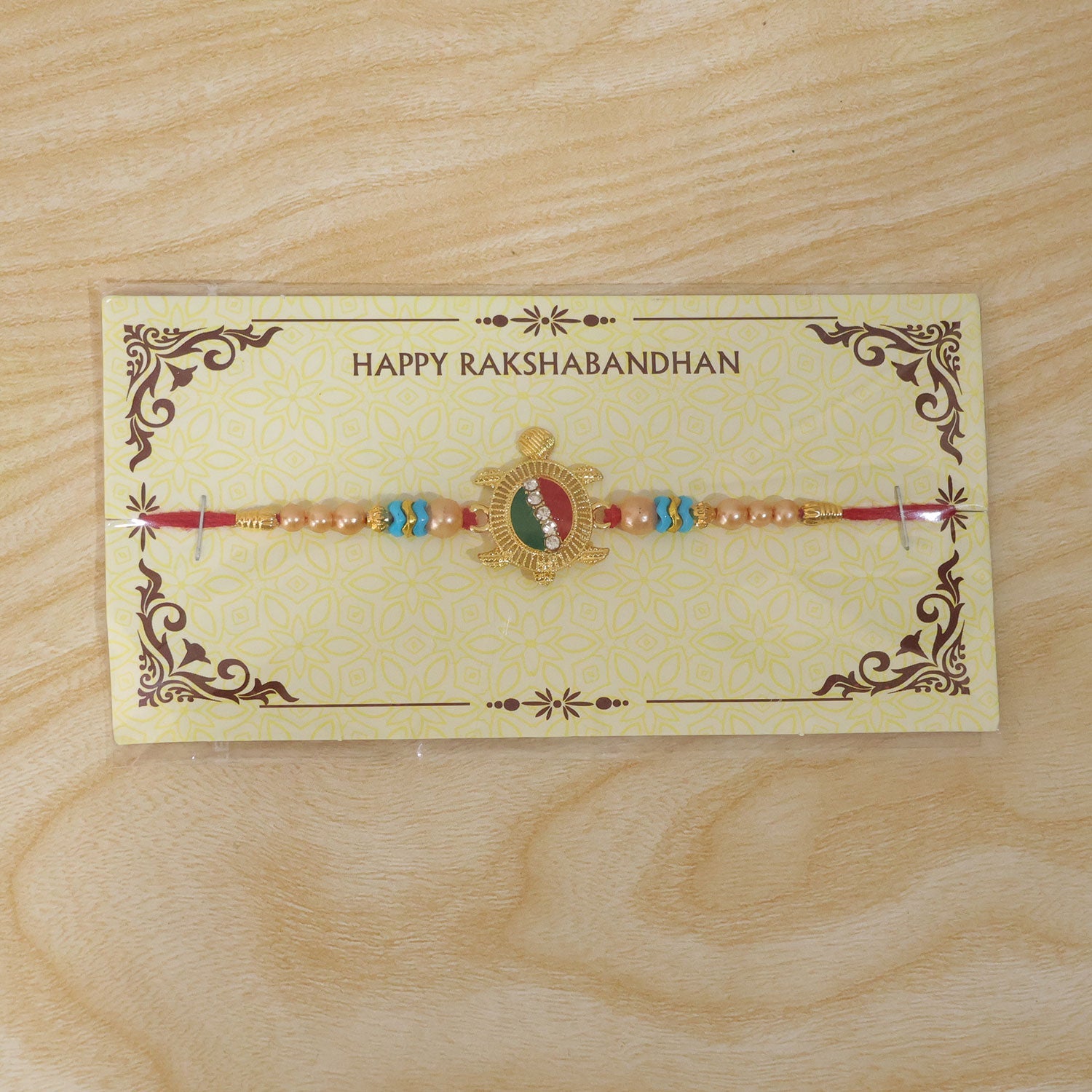 Auspicious Tortoise Meenakari Stone-Studded Beaded Rakhi for Brother