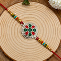 Rakshabandhan Silver Plated Floral Rakhi – Traditional & Elegant