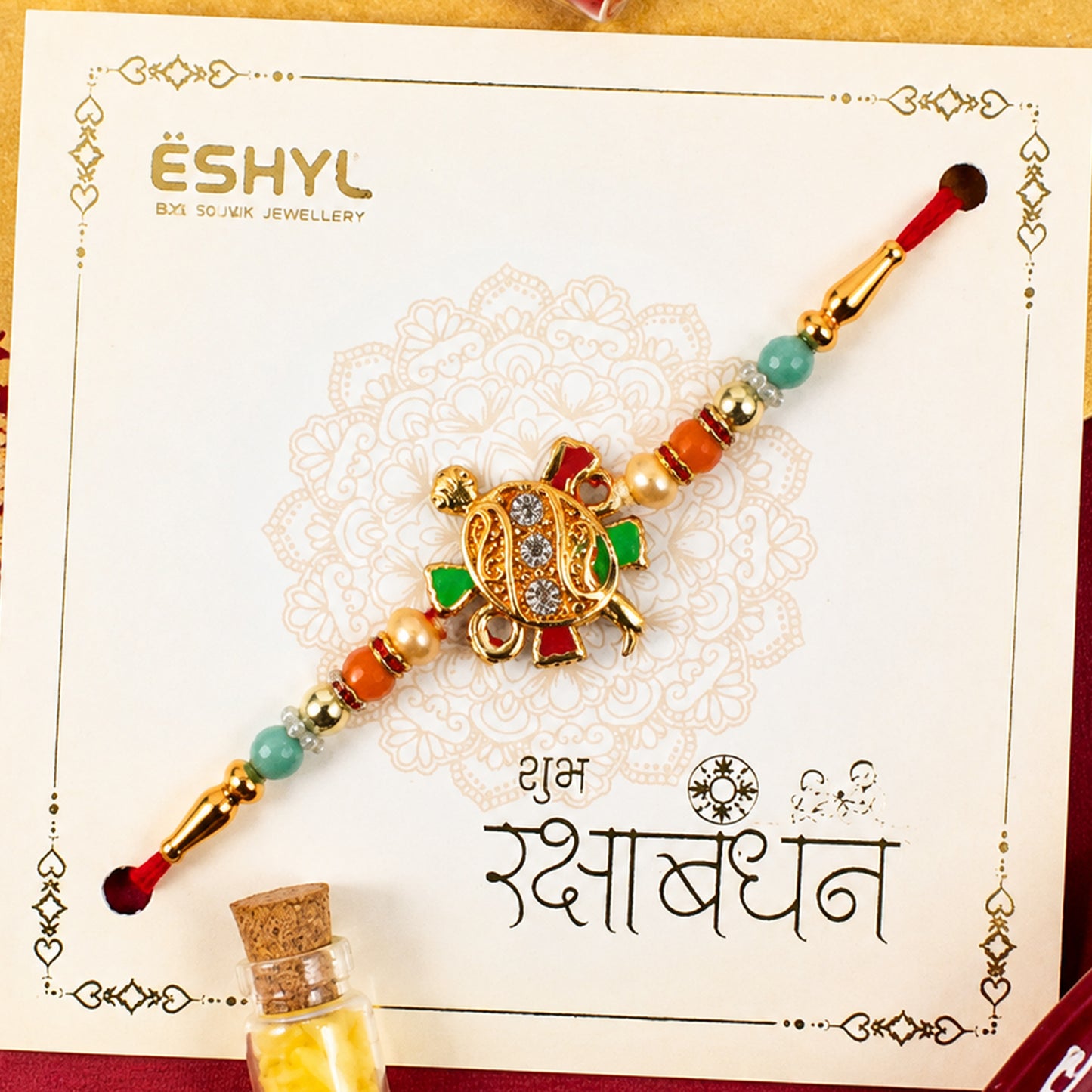 Tortoise Design Rakhi with stones and colorful beads full view