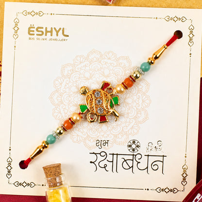 Tortoise Design Rakhi with stones and colorful beads full view