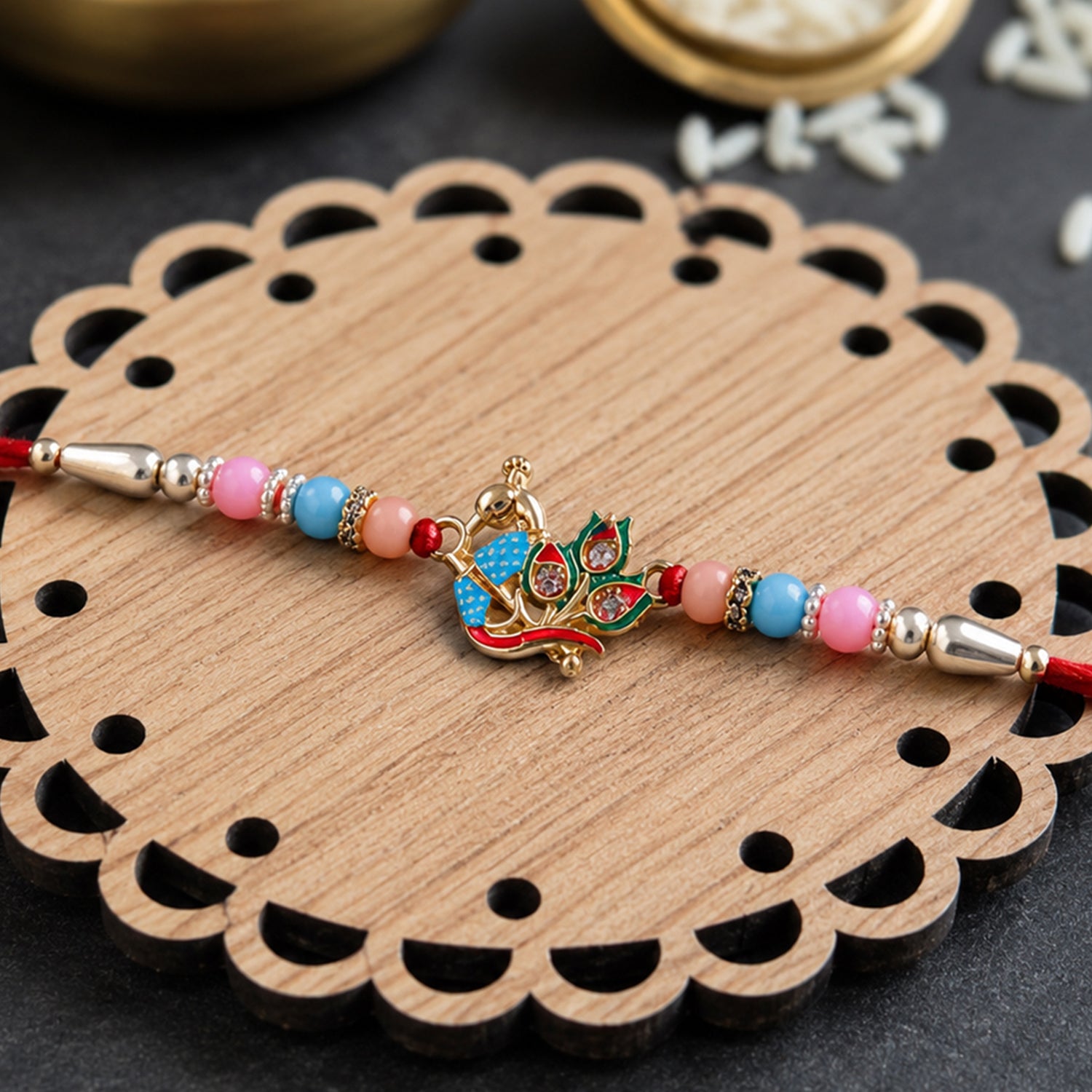 Premium Peacock Motif Designer Rakhi with multicolor beads