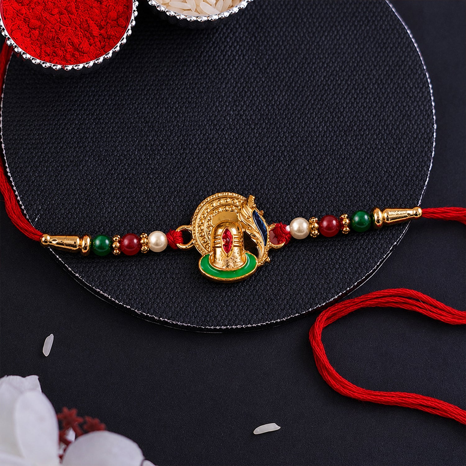 Traditional Designer Ganesha Rakhi with Decorative Beads