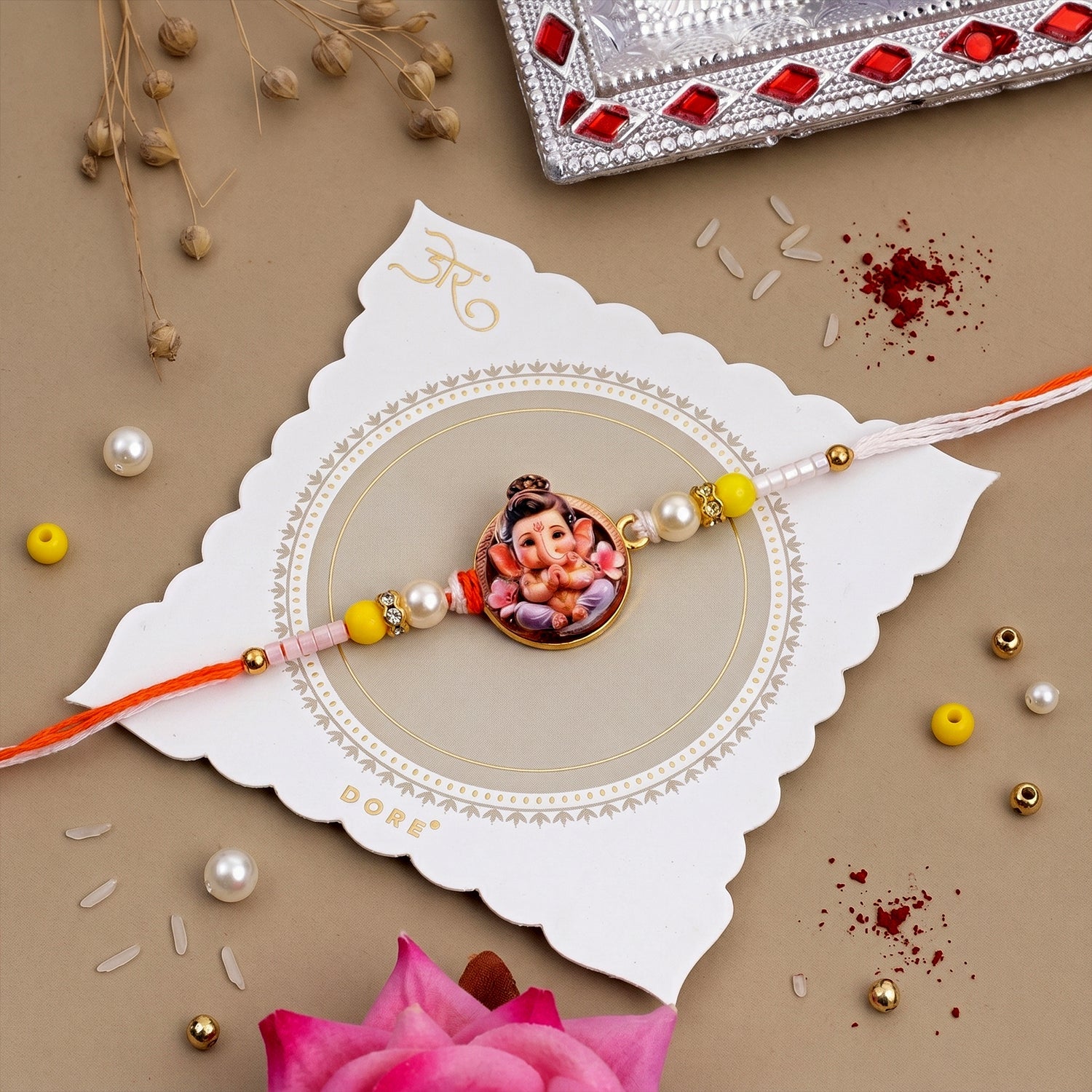 Ganesh Ji premium Rakhi with colorful beads and red thread