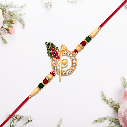 Krishna Flute Rakhi showing stone-studded peacock feather design