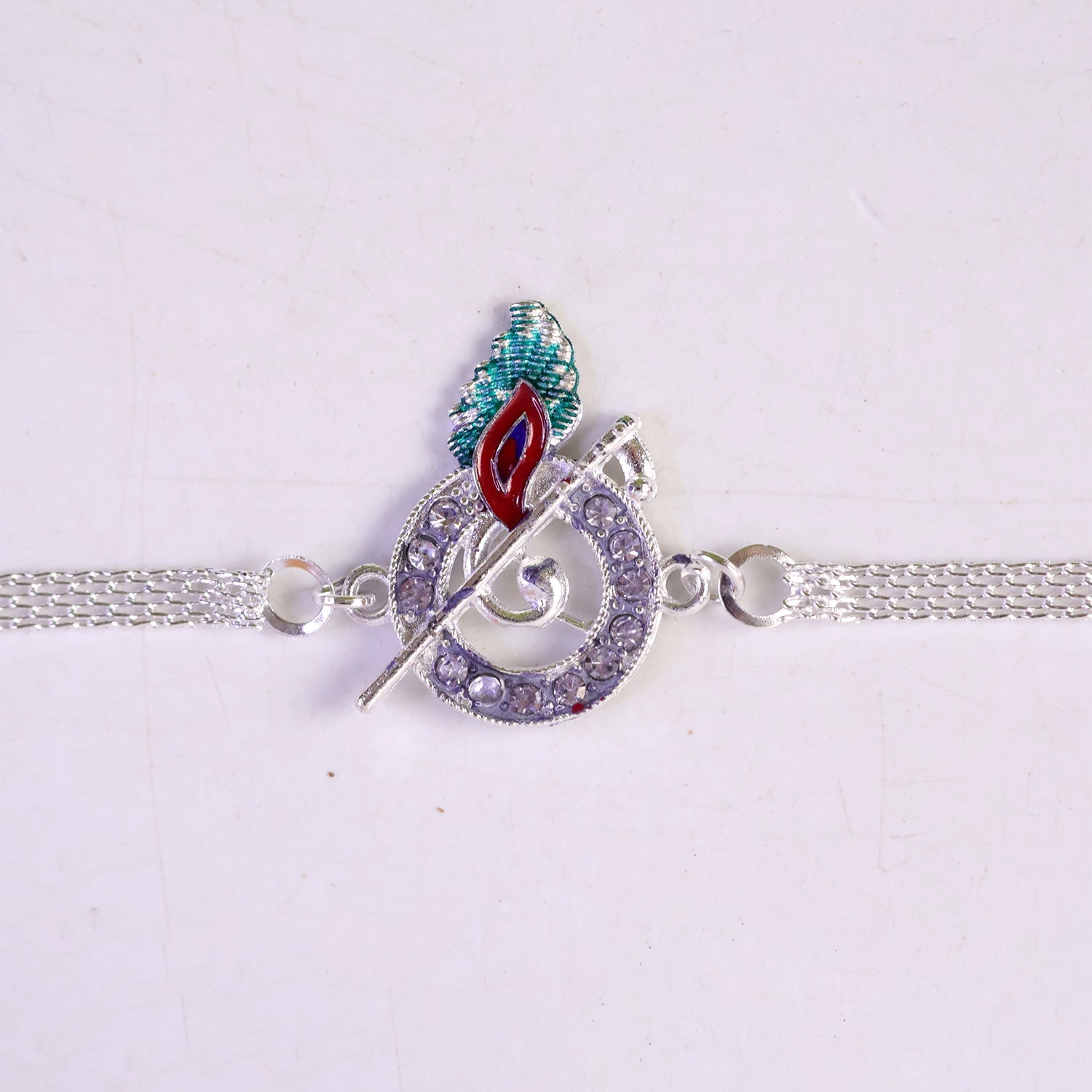 Krishna Morpankh Bansuri Stone-Studded Chain Rakhi for Brother