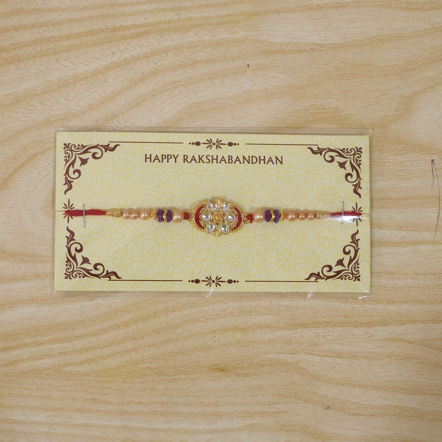 Oval Kundan Floral Stone-Studded Beaded Designer Rakhi for Brother