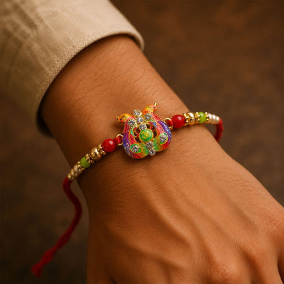 Meenakari Om Twin Peacock Stone-Studded Rakhi for Brother
