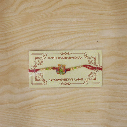 Meenakari Om Twin Peacock Stone-Studded Rakhi for Brother