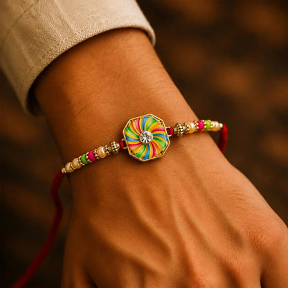 Designer Rakhi for Brother – Pinwheel Meenakari Sparkling Stone