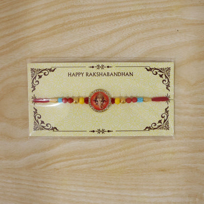 Divine Lord Ganesha Stone-Studded Beaded Rakhi for Brother