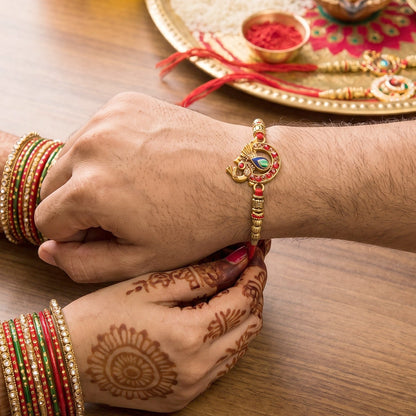 Top view of Kundan Peacock Bhabhi Rakhi with Pearl Latkan