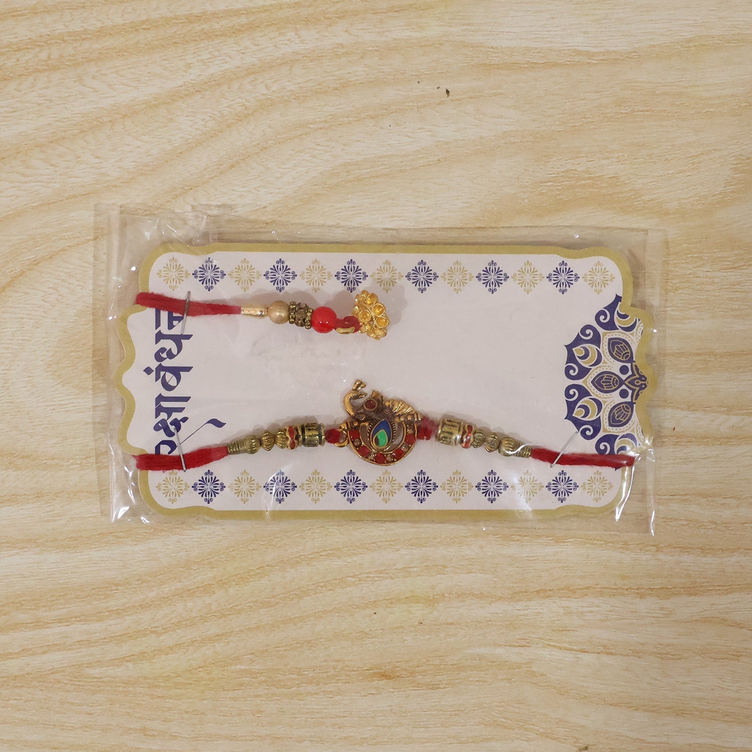 Elegant design of Kundan Peacock Bhabhi Rakhi with Pearl Latkan