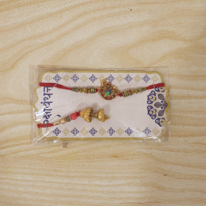 Peacock Pendant Bhabhi Rakhi side angle with Jhumka Latkan