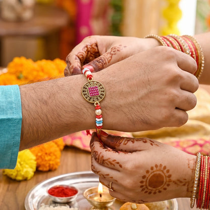 Top angle of Meenakari Bead Bhabhi Rakhi showing decorative beads