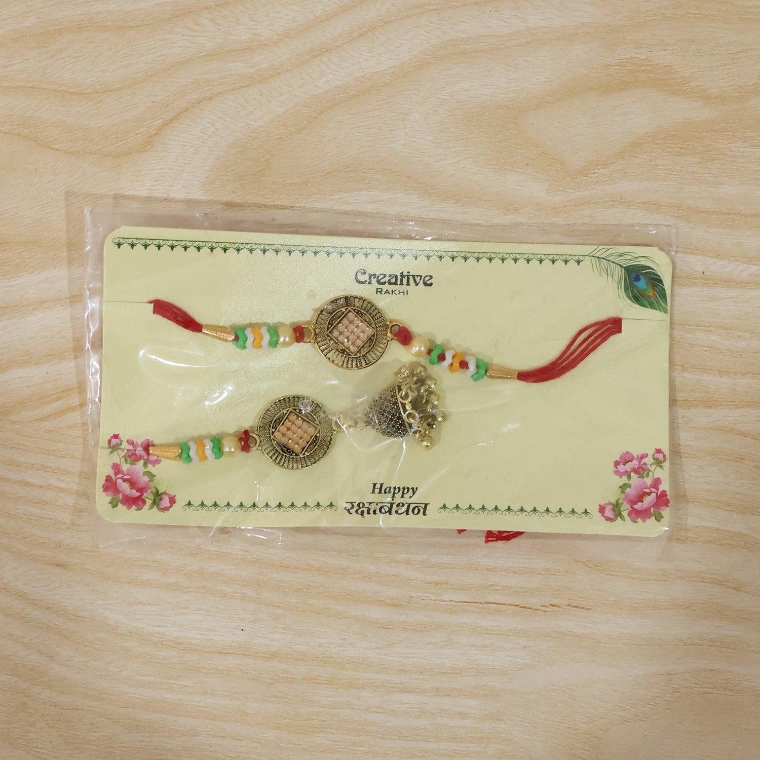 Antique Coin Bhabhi Rakhi with latkan hanging detail