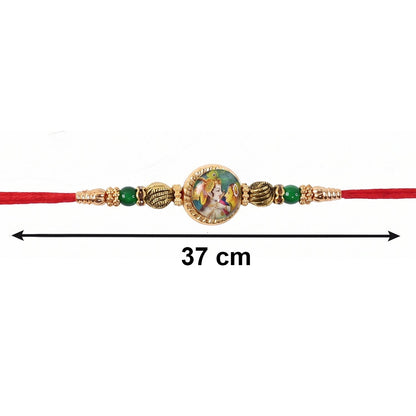 Peacock charm detail on Bhabhi Rakhi with beads