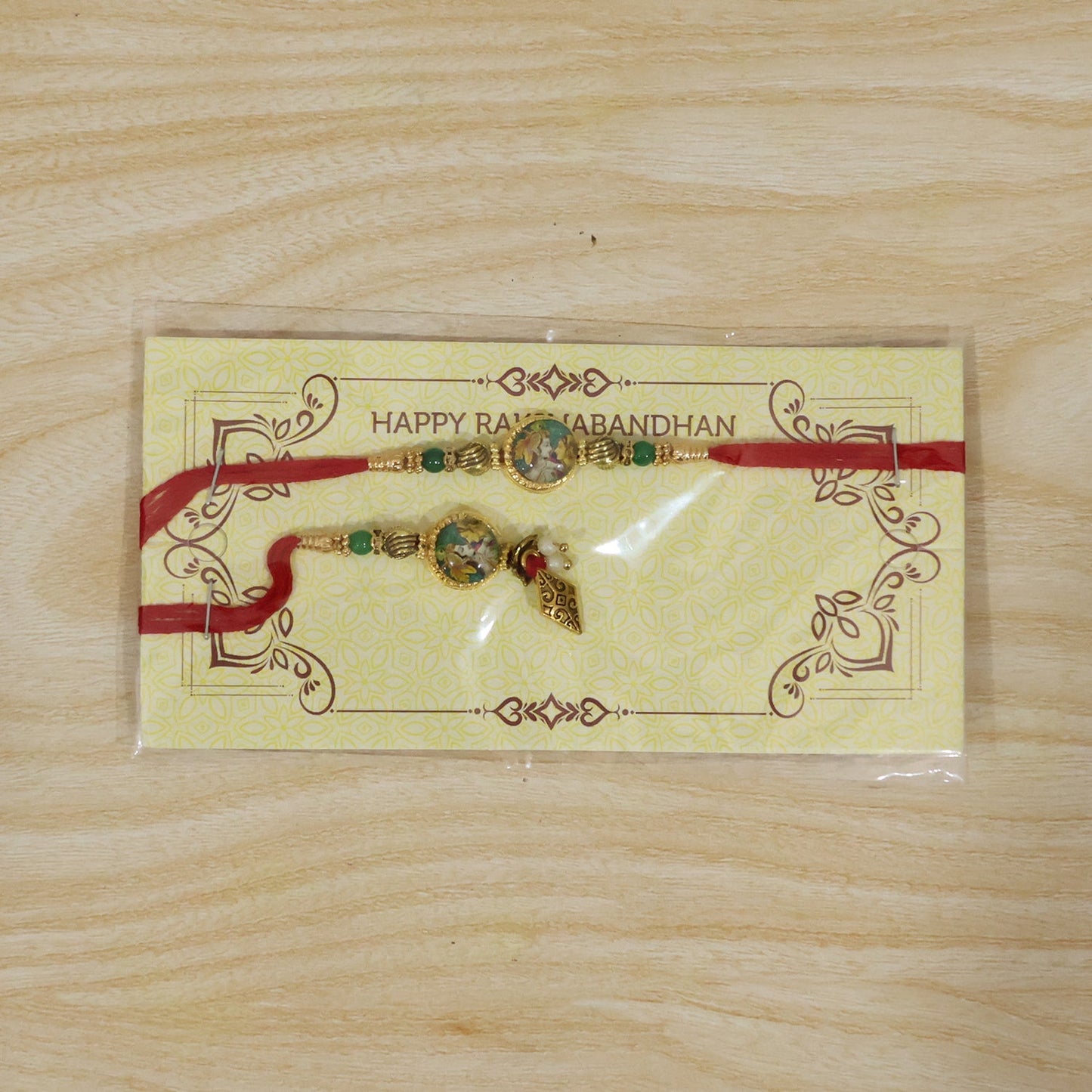 Full view of Peacock Charm Bhabhi Rakhi showing design and colors