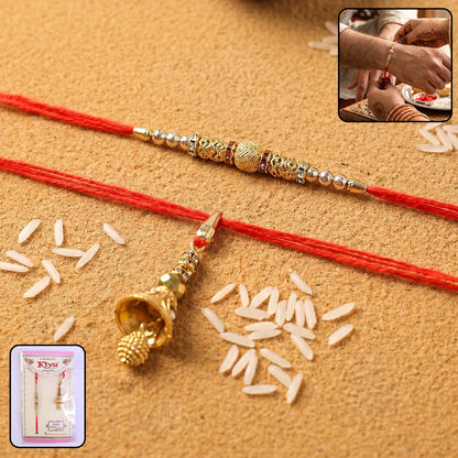 Sleek golden bhabhi rakhi with pearl drop latkan on white background