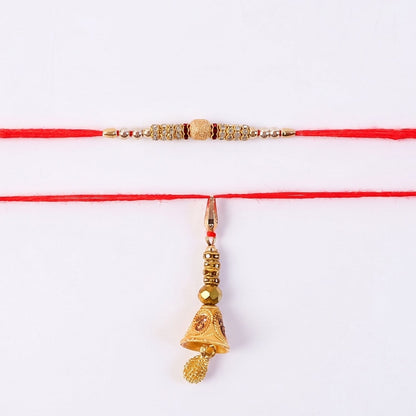 Golden bhabhi rakhi displayed with pearl drop latkan detail