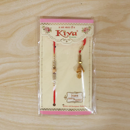 Side view of golden bhabhi rakhi with pearl drop latkan