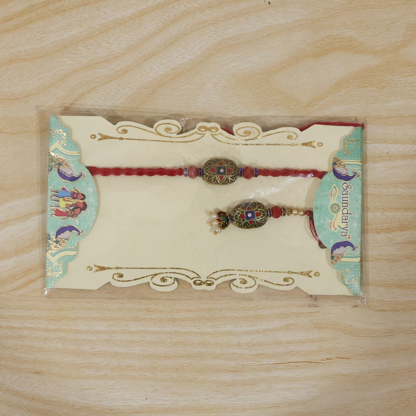 Decorative pearl latkan on Meenakari Bhabhi Rakhi