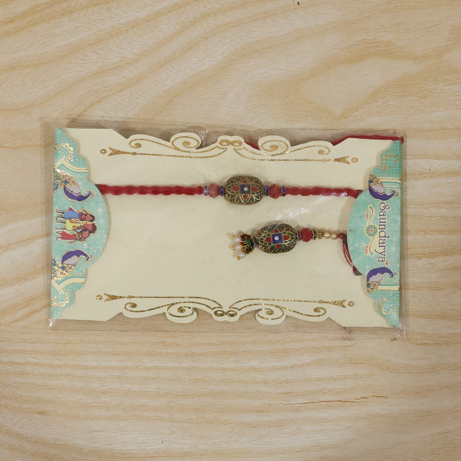 Decorative pearl latkan on Meenakari Bhabhi Rakhi