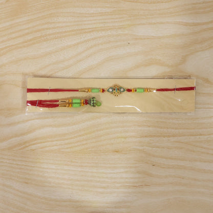 Om Peacock Bhabhi Rakhi displayed on white background