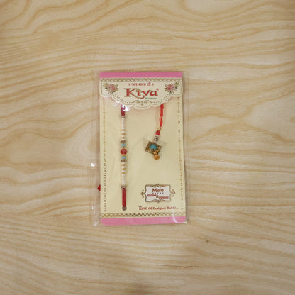 Detailed bead work on Bhabhi Rakhi with elegant latkan
