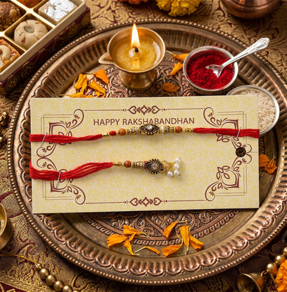 Antique stone Bhabhi Rakhi featuring pearl beads close-up