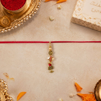 Golden Peacock Bhabhi Rakhi and packaging