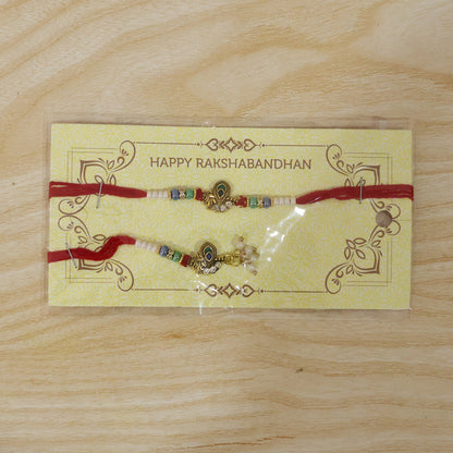 Pearl Cluster Bhabhi Rakhi with peacock charm fully displayed