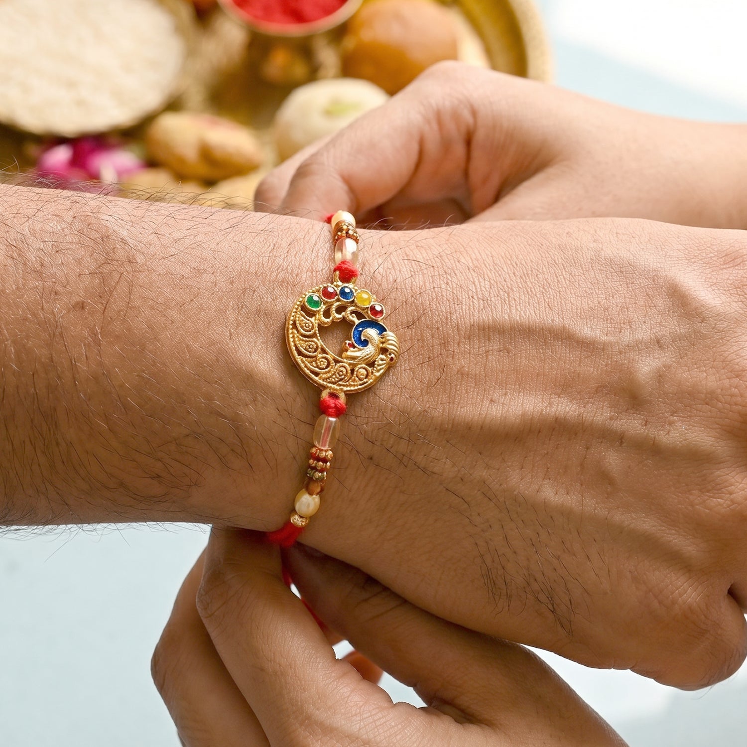 Antique Coin Bhabhi Rakhi laid flat highlighting coin