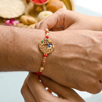 Antique Coin Bhabhi Rakhi laid flat highlighting coin