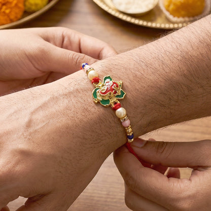 Top view of Floral Peacock Bhabhi Rakhi with intricate bead work
