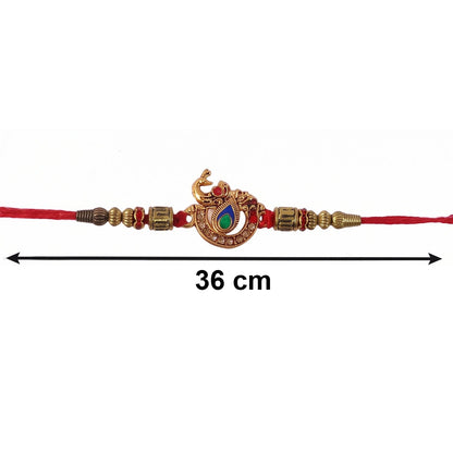 Elegant pearl latkan on Bhabhi Rakhi with peacock design