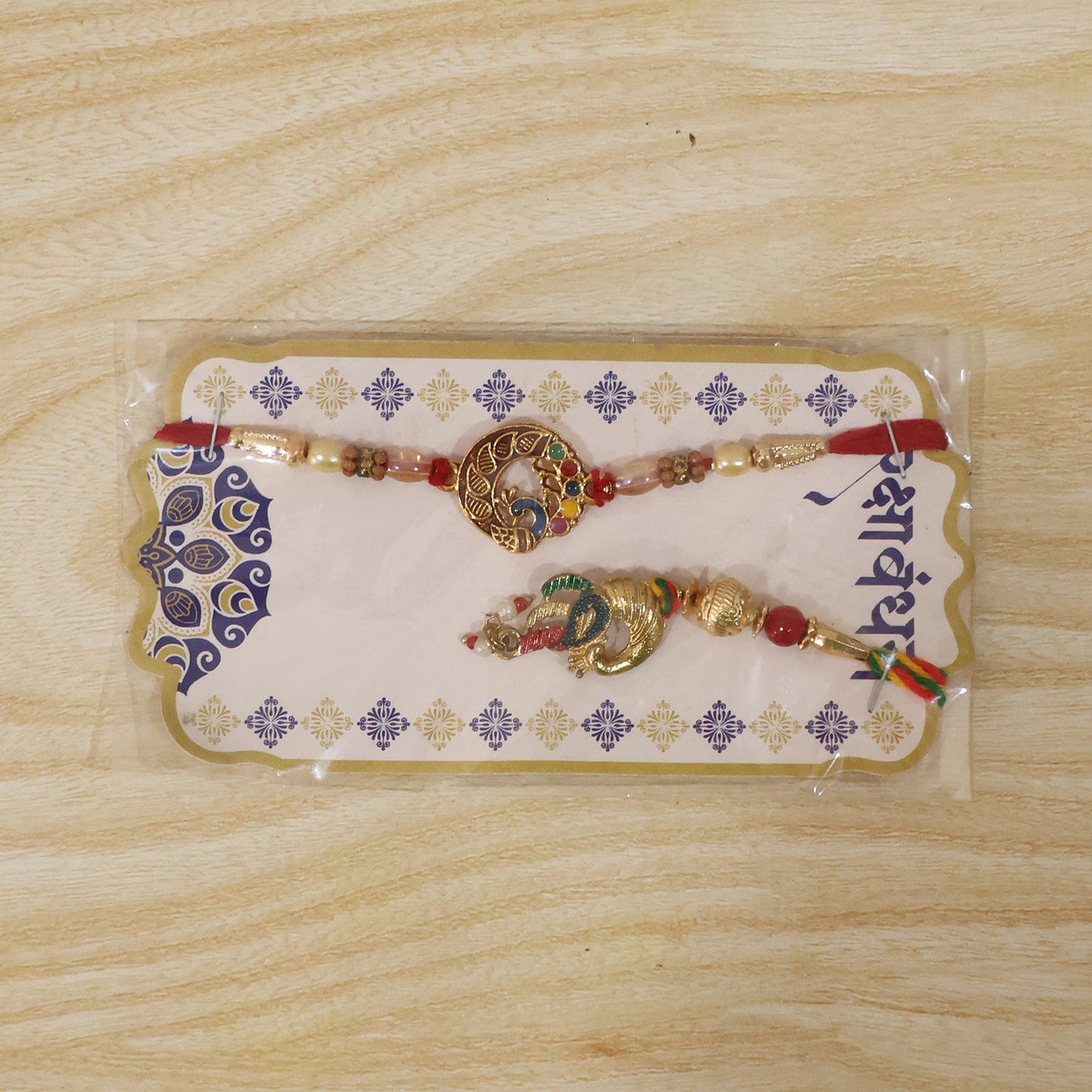 Peacock Charm Bhabhi Rakhi in decorative packaging