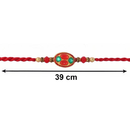 Detailed view of the stone and gold tone latkan on Bhabhi Rakhi
