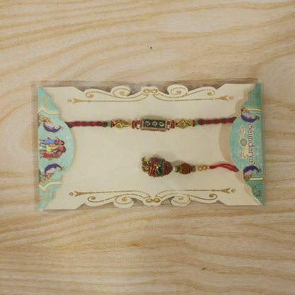 Front view of Meenakari Rectangle Bhabhi Rakhi with pearl drop