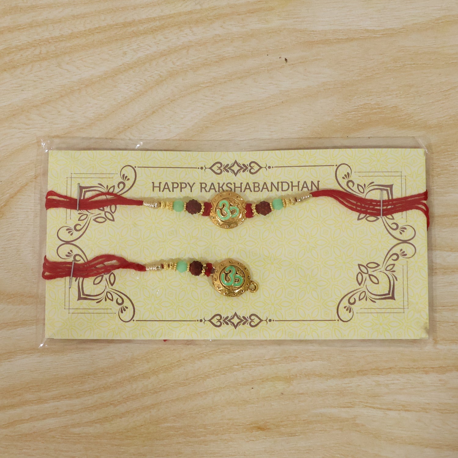 Swirl Coin Bhabhi Rakhi displayed with intricate pearl work