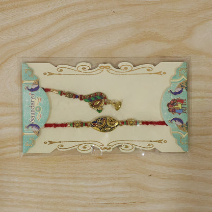 Side angle of Bhabhi Rakhi with peacock design