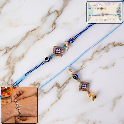 Side view of Pearl Bhabhi Rakhi twin charm design
