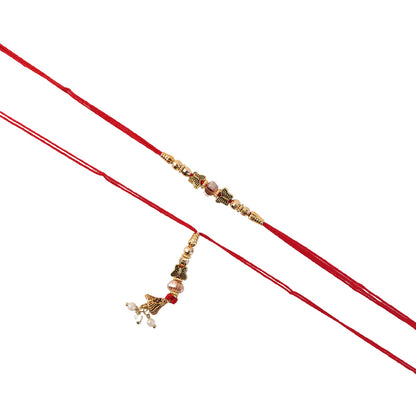 Hand holding the Sleek Stone Bhabhi Rakhi