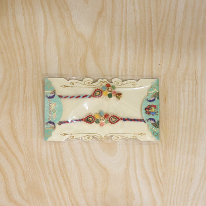 Traditional rakhi showcasing artistic meenakari work and vivid colors