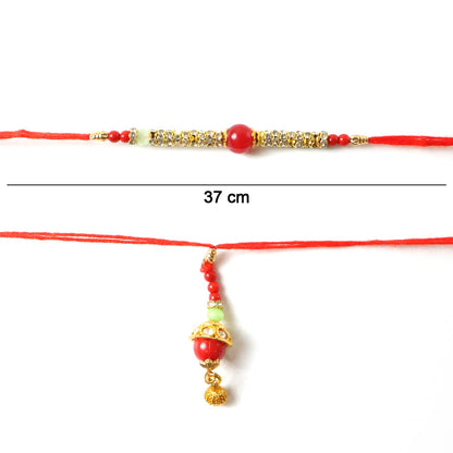 Red Pearl Bhabhi Rakhi tied with decorative string