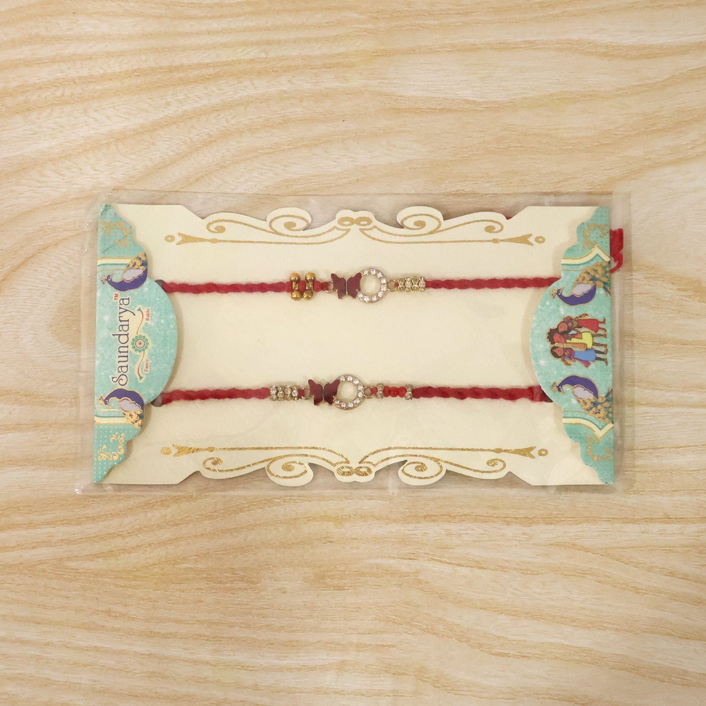 Side view of Mirror Stone Bhabhi Rakhi and red thread